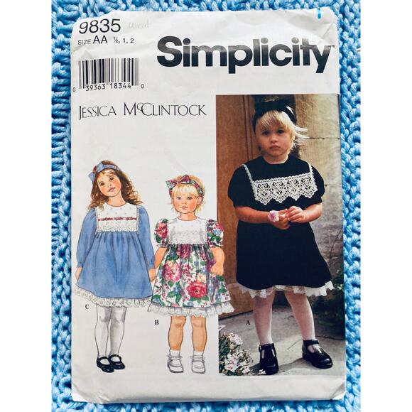 Simplicity 9835 Sewing pattern girl dress puff sleeve lace hem size 1/2 1 2 - Picture 1 of 5